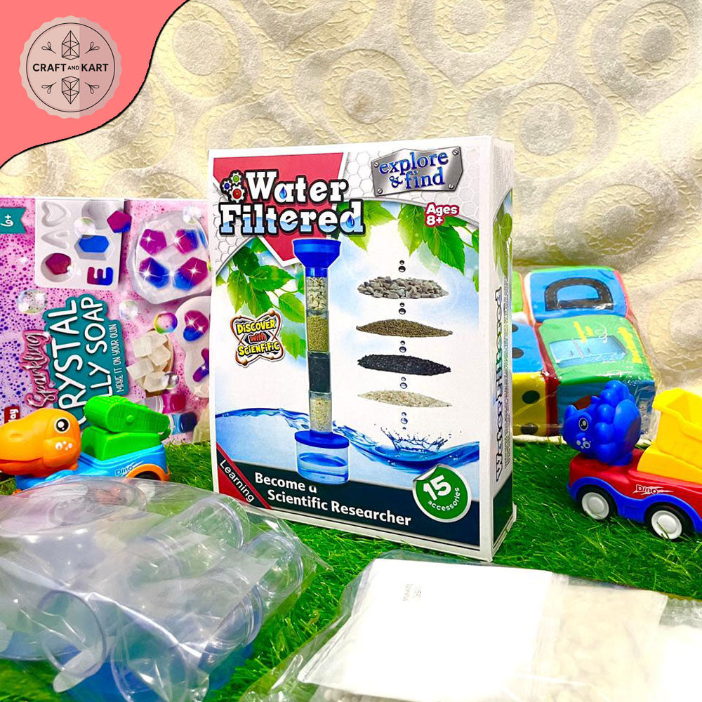 Children's toys including a water filter set and toy cars on a textured surface.