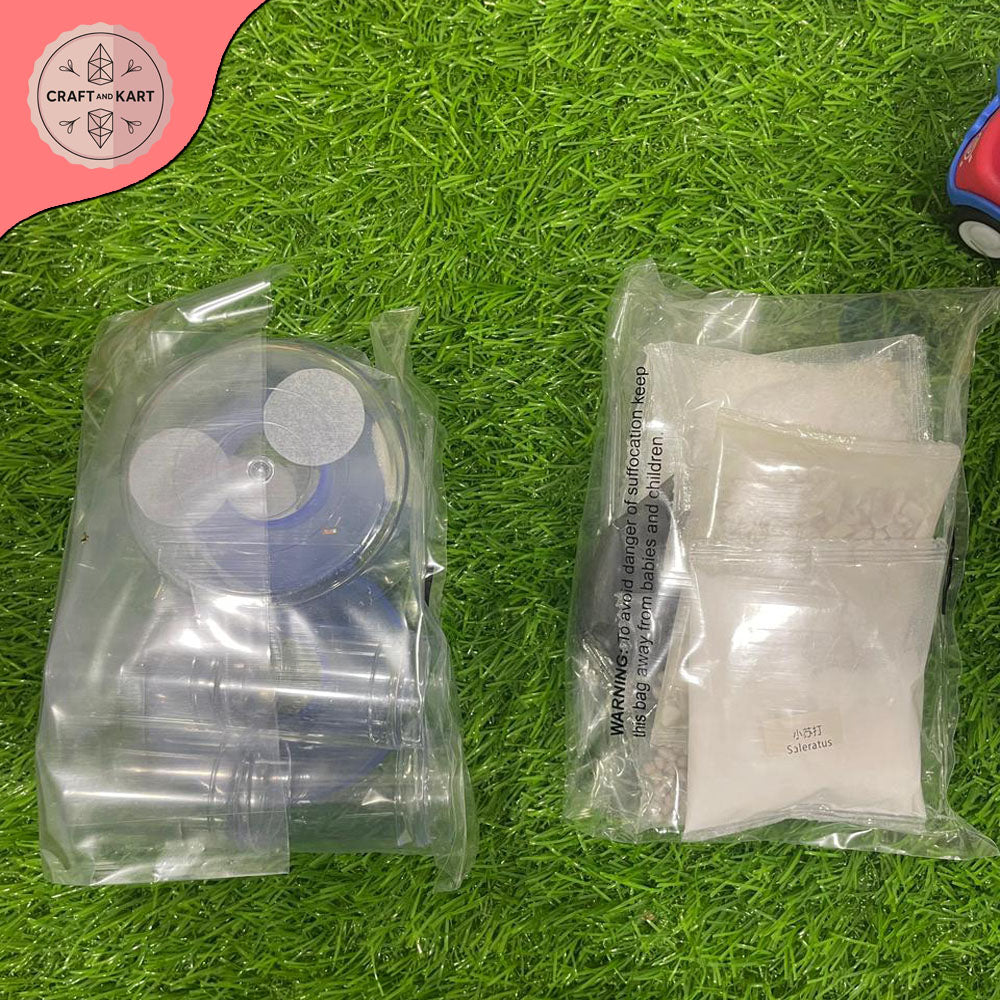 Two clear plastic packages on a grassy surface with 'Craft on a Kart' logo.